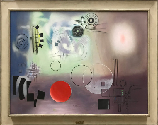 An abstract painting by Jean Xceron from 1946 titled "Radar." A group of shapes, mostly in or outlined in black, but also including a red disc, float against a fuzzy, almost cloudy background. Some of them suggest radar implements.
